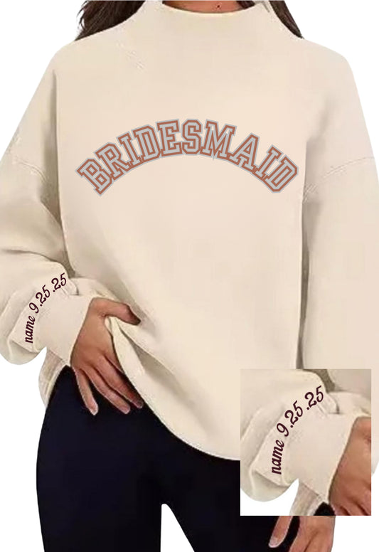BRIDESMAID oversized block letters w/ date & last name on cuff on a mock neck soft oversized sweatshirt. PARK like